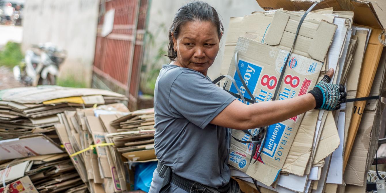 Female waste picker in Vientiane, Laos Female waste picker in Vientiane, Laos